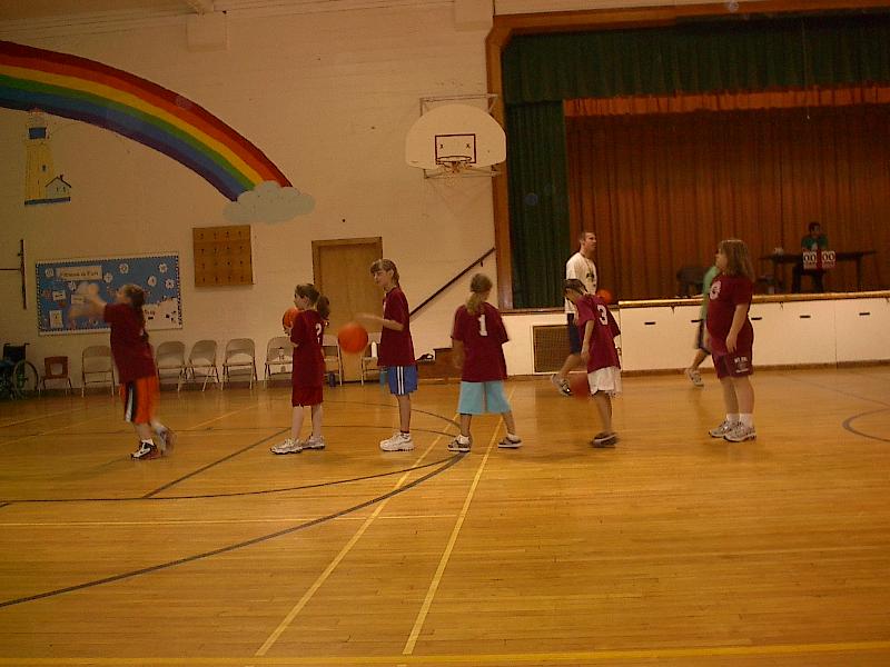 IM006351 Madeline's basketball team.  Madeline is #1, with the blue shorts